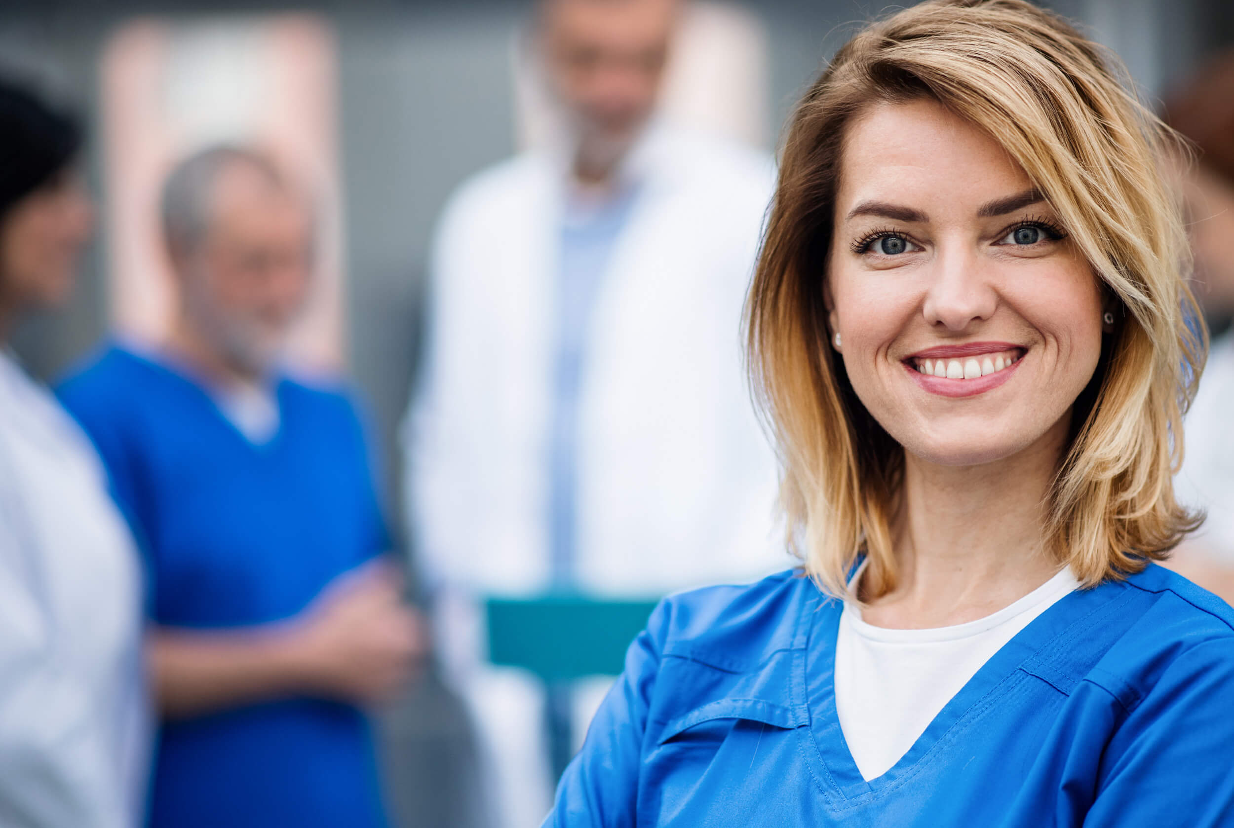 portrait-of-doctor-standing-in-hospital-on-medical-4H3NP4J.jpg